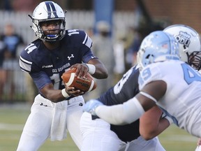 In this Saturday, Sept. 16, 2017 photo, Old Dominion quarterback Steven Williams Jr. takes a snap during an NCAA college football game against North Carolina in Norfolk, Va. Old Dominion coach Bobby Wilder was looking for an offensive spark when he sent 17-year-old freshman Steven Williams Jr. into last weekend's game against North Carolina. What he thinks he found instead is a quarterback.  (AP Photo/Jason Hirschfeld, File)