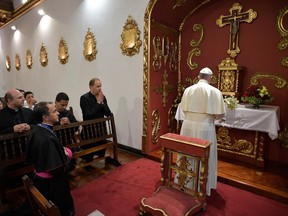 Pope Francis prays in the chapel of the Nunciature after his arrival in Bogota, Colombia, Wednesday, Sept. 6, 2017.  (L'Osservatore Romano/Pool Photo via AP)