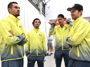 Team Australia's players, from left, Nick Kyrgios, Jordan Thompson, Thanasi Kokkinakis and John Peers pose during a media conference prior to a Davis Cup World Group semi-final tennis match in Brussels, Tuesday, Sept. 12, 2017. Belgium plays a semi-final against Australia beginning Friday, Sept. 15, 2017. (AP Photo/Geert Vanden Wijngaert)