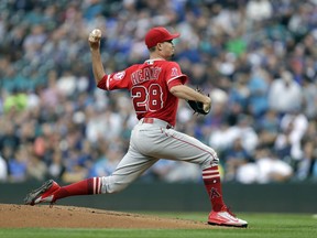 Los Angeles Angels starting pitcher Andrew Heaney works against the Seattle Mariners during the first inning of a baseball game Saturday, Sept. 9, 2017, in Seattle. (AP Photo/John Froschauer)
