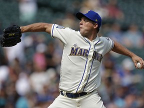 Seattle Mariners starting pitcher Andrew Albers throws against the Oakland Athletics in the first inning of a baseball game, Sunday, Sept. 3, 2017, in Seattle. (AP Photo/Ted S. Warren)