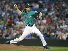 Seattle Mariners starting pitcher Mike Leake throws to a Los Angeles Angels batter during the first inning of a baseball game, Friday, Sept. 8, 2017, in Seattle. (AP Photo/Ted S. Warren)