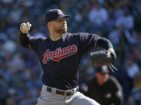 Cleveland Indians starting pitcher Corey Kluber throws against the Seattle Mariners during the first inning of a baseball game, Sunday, Sept. 24, 2017, in Seattle. (AP Photo/Ted S. Warren)