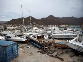 Wrecked boats in Geminga shipyard in Marigot, taken on September 9, 2017 in Saint-Martin island devastated by Irma hurricane. Officials on the island of Guadeloupe, where French aid efforts are being coordinated, suspended boat crossings to the hardest-hit territories of St. Martin and St. Barts where 11 people have died. Two days after Hurricane Irma swept over the eastern Caribbean, killing at least 17 people and devastating thousands of homes, some islands braced for a second battering from Hurricane Jose this weekend. MARTIN BUREAU/AFP/Getty Images