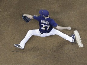 Milwaukee Brewers starting pitcher Zach Davies throws during the first inning of a baseball game against the Cincinnati Reds Tuesday, Sept. 26, 2017, in Milwaukee. (AP Photo/Morry Gash)