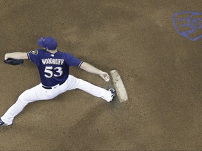 Milwaukee Brewers starting pitcher Brandon Woodruff throws during the first inning of a baseball game against the Cincinnati Reds Wednesday, Sept. 27, 2017, in Milwaukee. (AP Photo/Morry Gash)