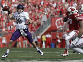 Northwestern's Clayton Thorson throws during the first half of an NCAA college football game against Wisconsin Saturday, Sept. 30, 2017, in Madison, Wis. (AP Photo/Morry Gash)