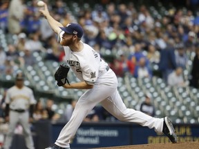 Milwaukee Brewers starting pitcher Brandon Woodruff throws during the first inning of a baseball game against the Pittsburgh Pirates Monday, Sept. 11, 2017, in Milwaukee. (AP Photo/Morry Gash)