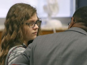 Anissa Weier listens to defense attorney Joseph Smith Jr. during closing arguments in her case before Waukesha County Circuit Court Judge Michael Bohren on Friday, Sept. 15, 2017, in Waukesha, Wis. Weier is accused of helping her friend stab their classmate nearly to death to please online horror character Slender Man. (C.T. Kruger /Milwaukee Journal-Sentinel via AP, Pool)