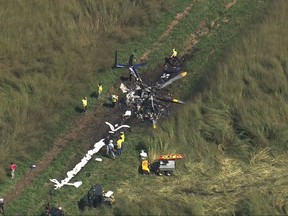This aerial view shows the wreckage of a Duke Health System medical helicopter which crashed near Belvidere, N.C., on Friday, Sept. 8, 2017. The North Carolina Highway Patrol says the accident caused fatalities. (Keith Baker/WRAL via AP)