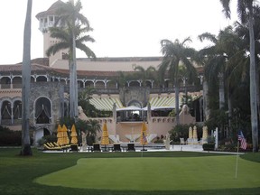 FILE - This April 15, 2017, file photo shows President Donald Trump's Mar-a-Lago estate in Palm Beach, Fla. They were expecting extensive visitor logs from President Donald Trump's Mar-a-Lago resort. Instead, a group of government watchdogs got a list of 22 Japanese officials who'd joined their country's prime minister at the property during a February trip. Justice Department officials say the remaining records are exempt from public records laws. (AP Photo/Alex Brandon, File)