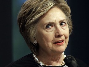 In this June 5, 2017 photo, former Secretary of State Hillary Clinton speaks at a fundraiser for the Elijah Cummings Youth Program in Israel in Baltimore. The FBI's Hillary Clinton email investigation that ended without charges remains a lingering grievance for President Donald Trump, who holds it up as an example of a "rigged" system. (AP Photo/Patrick Semansky)
