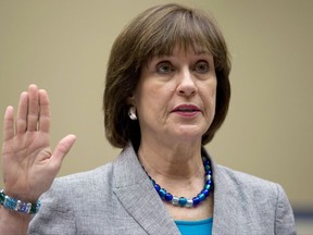 In this May 22, 2013 file photo, IRS official Lois Lerner is sworn in on Capitol Hill in Washington before the House Oversight Committee. The Department of Justice has once again decided not to charge Lerner in the IRS' mistreatment of conservative political groups during the 2010 and 2012 elections.  (AP Photo/Carolyn Kaster)