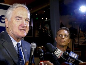 FILE- In this Aug. 15, 2017, file photo, Sen. Luther Strange speaks to media after forcing a runoff against former Chief Justice Roy Moore in Homewood, Ala. President Donald Trump's political muscles are getting a workout in a Republican runoff election in Alabama that has an awkward dynamic: He's campaigning for the establishment-backed incumbent over an upstart beloved by many of his most ardent supporters and backed by a cast of players that reads like a roster of Team Trump. Trump heads to Huntsville, Ala., on Sept. 22 to campaign for Strange, appointed in February to temporarily fill the seat that opened up when Jeff Sessions became attorney general. (AP Photo/Butch Dill, File)