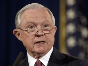 FILE - In this Sept. 5, 2017, file photo, Attorney General Jeff Sessions speaks at the Justice Department in Washington. Authorities are touting the arrests of thousands of gang members in the U.S. and Central America as a sign that teamwork and the Trump administration's push to crackdown on MS-13.  Justice Department officials will gather with attorneys general from Honduras, Guatemala and El Salvador during a Miami visit to share intelligence and strategies for future investigations. (AP Photo/Susan Walsh, File)