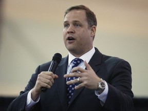 FILE - In this Feb. 28, 2016, file photo, Rep. Jim Bridenstine, R-Tulsa, speaks in Tulsa, Okla. President Donald Trump's choice to head NASA faces a contentious Senate confirmation over his past comments dismissive of global warming as a man-made problem. Trump has Bridenstine to oversee the space agency, a job that often goes to astronauts or scientists. If confirmed, Bridenstine would be the first member of Congress to lead the agency during its nearly 60-year existence. (AP Photo/Sue Ogrocki, File)
