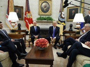 In this Sept. 6, 2017, photo, President Donald Trump pauses during a meeting with Congressional leaders in the Oval Office of the White House, Wednesday, Sept. 6, 2017, in Washington. From left, Speaker of the House Paul Ryan, R-Wis., Vice President Mike Pence, Trump, and Senate Majority Leader Mitch McConnell, R-Ky. The tortured relationship between Trump and Ryan has gone cool again, with the Republican president making clear he has no qualms about bucking the GOP leader to cut deals with his Democratic foes. (AP Photo/Evan Vucci)