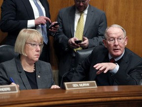 FILE - In this Jan. 31, 2017 file photo, Senate Health, Education, Labor, and Pensions Committee Chairman Sen. Lamar Alexander, R-Tenn., accompanied by the committee's ranking member Sen. Patty Murray, D-Wash. speaks on Capitol Hill in Washington.  Millions of people who buy individual health insurance policies and get no government help for premiums are facing another year of double-digit premium increases and frustration is boiling over.  (AP Photo/Alex Brandon, File)