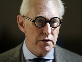 FILE - In this March 30, 2017, file photo, Roger Stone talks to reporters outside a courtroom in New York. The House intelligence panel will interview two of President Donald Trump's associates behind closed doors this week as congressional committees step up their investigations into Russian meddling in the 2016 election. Longtime Trump associate Roger Stone and former staffer Boris Epshteyn will talk to the House panel. Stone will be interviewed on Sept. 26.  (AP Photo/Seth Wenig, File)