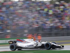 Canadian driver Lance Stroll steers his Williams during the qualifying session for Sunday's Formula One Italian Grand Prix, at the Monza racetrack, Italy, Saturday, Sept. 2, 2017. (AP Photo/Antonio Calanni)