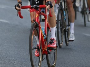 Britain's Chris Froome pedals on his way to win the Spanish Vuelta cycling race, in Madrid, Sunday, Sept. 9, 2017. (AP Photo/Francisco Seco)