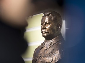 A bust of Josef Stalin is on display in Moscow, Russia, Friday, Sept. 22, 2017. The Russian Military-Historic Society, an organization founded by President Vladimir Putin and led by his culture minister, unveiled the sculptures Friday to expand its "alley of rulers" at a Moscow park, which until now had featured busts of Russian monarchs. It described the new display as part of efforts to preserve Russian history. (AP Photo/Alexander Zemlianichenko)