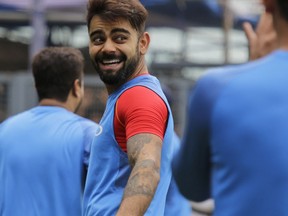 Indian cricket captain Virat Kohli attends a practice session on the eve of their second one-day international match against Australia in Kolkata, India, Wednesday, Sept. 20, 2017. (AP Photo/Bikas Das)