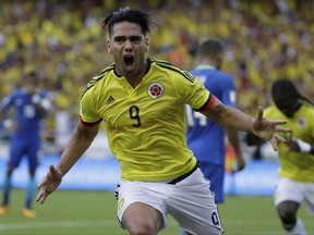 Colombia's Radamel Falcao celebrates after scoring a goal against Brazil during a 2018 World Cup qualifying soccer match in Barranquilla, Colombia, Tuesday, Sept. 5, 2017. The match ended in a 1-1 tie. (AP Photo/Ricardo Mazalan)