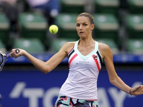 Karolina Pliskova of the Czech Republic returns a shot to Magda Linette of Poland during their second round match of the Japan Pan Pacific Open tennis tournament in Tokyo, Wednesday, Sept. 20, 2017. (AP Photo/Shizuo Kambayashi)
