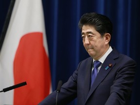 Japan's Prime Minister Shinzo Abe listens to a reporter's question during a press conference at the prime minister's official residence in Tokyo, Monday, Sept. 25, 2017. Prime Minister Abe announced Monday he will call a snap election for parliament's more powerful lower house for next month.  Abe said at a news conference that he will dissolve the chamber on Thursday when it convenes after a three-month summer recess. The election is to be held Oct. 22. (AP Photo/Shizuo Kambayashi)