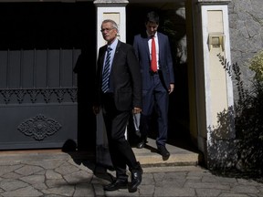 French investigative magistrate Renaud van Ruymbeke leaves the residence of Carlos Nuzman, president of the Brazilian Olympic committee, in Rio de Janeiro, Brazil, Tuesday, Sept. 5, 2017. Federal police searched Nuzman's house Tuesday morning. French and Brazilian authorities have been working on a corruption investigation involving bribery surrounding the awarding of the 2016 Rio Games and the 2020 Tokyo Games. (AP Photo/Silvia Izquierdo)(AP Photo/Silvia Izquierdo)