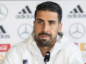 German player Sami Khedira attends  a press conference  prior Monday's group C World Cup qualification soccer match against Norway,  at the Mercedes Benz Museum in Stuttgart, Germany, Sunday, Sept. 3, 2017.  (Sebastian Gollnow/dpa via AP)