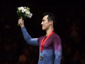 In this Jan. 21 file photo, Patrick Chan celebrates his gold medal at the national figure skating championships in OItawa.