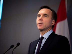 Federal Finance Minister Bill Morneau answers questions following a meeting with private sector economists in Toronto on Thursday, Oct. 5, 2017.