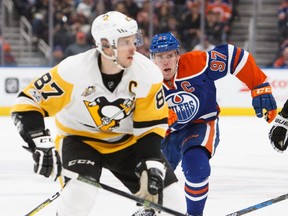 Edmonton Oilers forward Connor McDavid (right) pursues Pittsburgh Penguins forward Sidney Crosby on March 10.