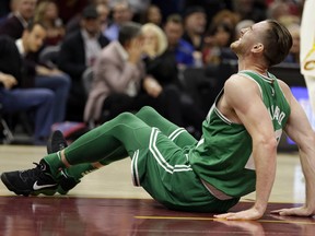 Boston Celtics forward Gordon Hayward grimaces in pain after breaking his left ankle in the first quarter of the season opener against the Cleveland Cavaliers on Oct. 17.