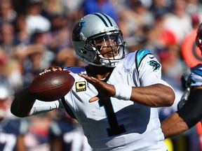 Cam Newton of the Carolina Panthers throws a pass against the New England Patriots at Gillette Stadium on Oct. 1, 2017.