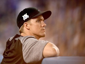 Arizona Diamondbacks pitcher Zack Greinke watches Game 1 of the NLDS from the dugout on Oct. 6.