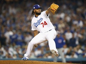 L.A. Dodgers closer Kenley Jansen pitches against the Chicago Cubs in the eighth inning during Game 1 of the National League Championship Series at Dodger Stadium on Oct. 14, 2017.