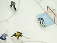 Phil Kesselof the Penguins scores the game winning goal past Connor Hellebuyck of the Winnipeg Jets in overtime during their game Thursday night in Pittsburgh. The Pens won 2-1.