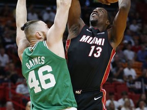 Miami Heat forward Bam Adebayo (13) goes up for a shot against Boston Celtics center Aron Baynes (46) during the first half of an NBA basketball game, Saturday, Oct. 28, 2017, in Miami. (AP Photo/Wilfredo Lee)
