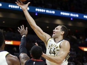 Indiana Pacers' Bojan Bogdanovic (44) drives to the basket as Miami Heat's Jordan Mickey (25) defends during the first half of an NBA basketball game, Saturday, Oct. 21, 2017, in Miami. (AP Photo/Lynne Sladky)