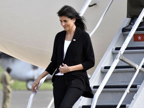 US Ambassador to the United Nations Nikki Haley arrives in Juba, South Sudan, Wednesday, Oct. 25, 2017. The U.S. ambassador to the United Nations, Nikki Haley, has been evacuated from a U.N. camp for displaced people in South Sudan because of a volatile demonstration against President Salva Kiir. An aid worker at the camp says U.N. security guards fired tear gas to disperse the crowd of more than 100 people shortly after Haley left. The ambassador, on a three-country Africa visit, met earlier with Kiir over the country's long civil war. (AP Photo)