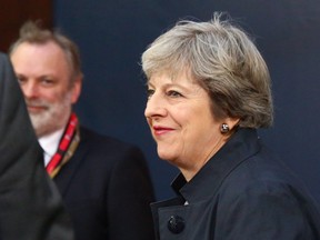 British Prime Minister Theresa May arrives on the second day of a summit of European Union leaders in Brussel on October 20, 2017.