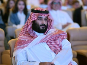 Saudi Crown Prince Mohammed bin Salman attends the Future Investment Initiative (FII) conference in Riyadh, on October 24, 2017. The Crown Prince pledged a "moderate, open" Saudi Arabia, breaking with ultra-conservative clerics in favour of an image catering to foreign investors and Saudi youth.  "We are returning to what we were before — a country of moderate Islam that is open to all religions and to the world," he said at the economic forum in Riyadh.