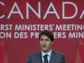 Canadian Prime Minister Justin Trudeau speaks during the closing news conference at the First Ministers Meeting in Ottawa, Tuesday October 3, 2017. THE CANADIAN PRESS/Adrian Wyld