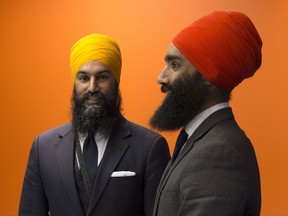NDP leader Jagmeet Singh (left) and his brother Gurratan Singh pose for a photo at the party offices in Ottawa, Wednesday,  October 25, 2017. THE CANADIAN PRESS/Adrian Wyld