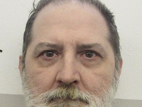 This undated photo provided by Alabama Department of Corrections shows Alabama inmate Jeffery Borden in Atmore, Ala. Borden is facing execution by lethal injection after being convicted of killing his wife and father-in-law during a 1993 Christmas Eve gathering. The Alabama attorney general on Monday, Oct. 2, 2017, asked the nation's high court to overturn an injunction blocking Thursday's execution of Borden. (Alabama Department of Corrections, via AP)