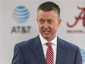 FILE - In this June 5, 2017, file photo, Alabama athletics director Greg Byrne speaks at a news conference in Tuscaloosa, Ala. On March 1, 2017, after stints as AD at Mississippi State and Arizona, the 45-year-old Byrne took over at Alabama and became NCAA college football head coach Nick Saban's boss. (Vasha Hunt/Alabama Media Group via AP, File)