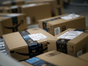 Boxes move along a conveyor belt at the Amazon.com fulfillment center in Kenosha, Wisconsin, U.S., on Tuesday, Aug. 1, 2017